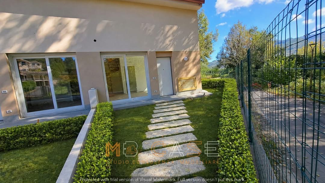 TRILOCALE DUPLEX CON GIARDINO E BOX